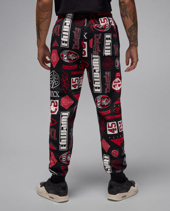 JORDAN ESSENTIAL AOP FLEECE PANTS | HM7257-010 BLACK/VARSITY RED